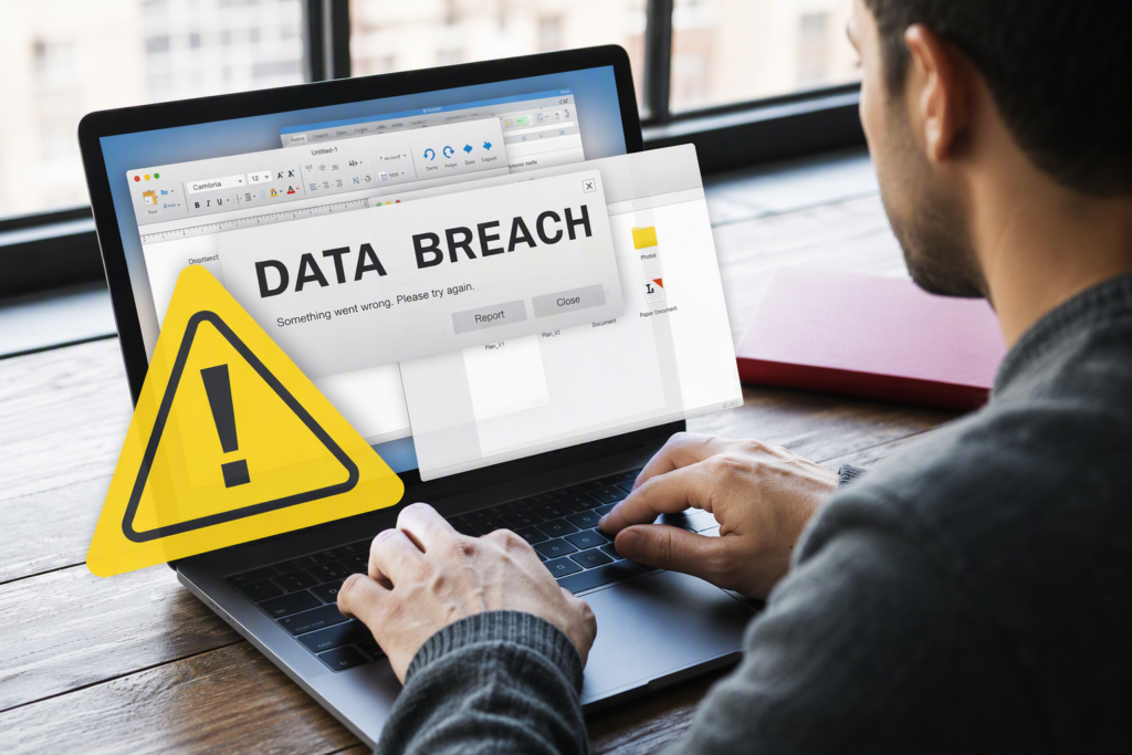 Business professional reviewing a vendor data breach notification on a laptop, illustrating third-party cybersecurity risk, vendor risk management, compliance concerns, and business continuity planning.